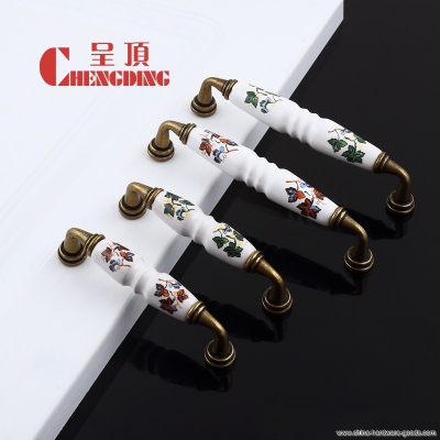 was a top 128mm white ceramic metal bronze imitation of classical pastoral drawer wardrobe door handle small pattern