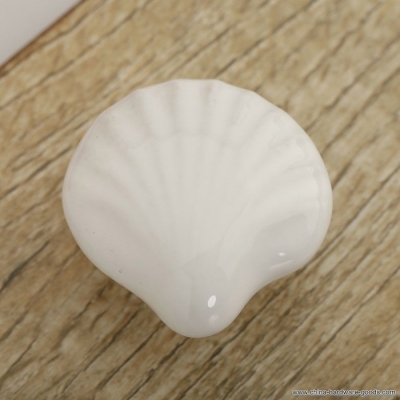 white ceramic kid's room wardrobe drawer pull kitchen cupboard cabinet door knob handle sea shell shape mediterranean style